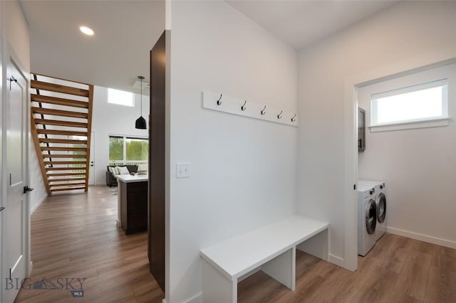 1942 Southbridge Unit B, Bozeman, MT 59718 - mudroom featuring independent washer and dryer, light wood-style floors, and recessed lighting