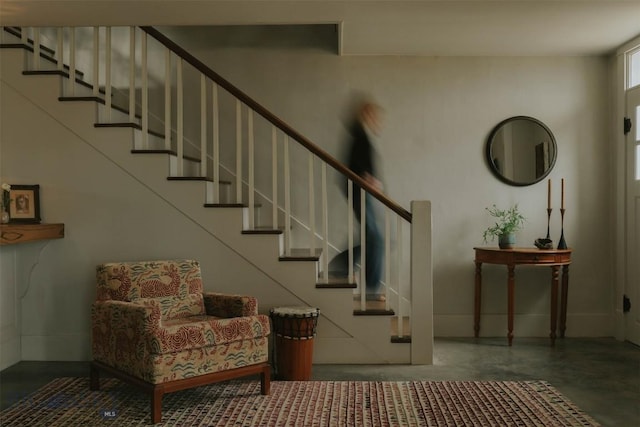 802 Deadmans Canyon Rd, Reed Point, MT 59069 - stairway featuring concrete floors and baseboards