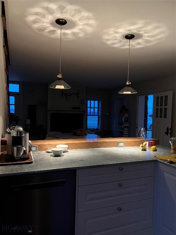 802 Deadmans Canyon Rd, Reed Point, MT 59069 - kitchen featuring light countertops and pendant lighting