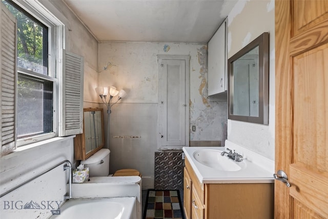 523 N I St, Livingston, MT 59047 - full bath with vanity, a bath, and tile patterned floors