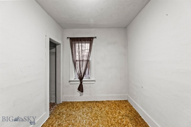 523 N I St, Livingston, MT 59047 - unfurnished bedroom featuring carpet and baseboards