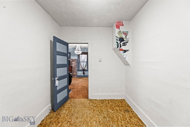 523 N I St, Livingston, MT 59047 - hallway featuring carpet floors and baseboards