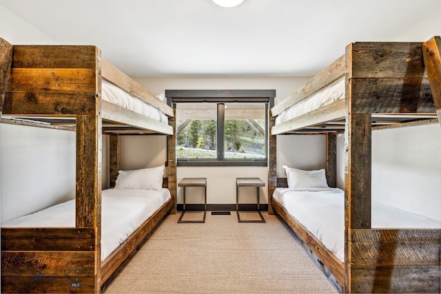 146 Outlook Trl, Big Sky, MT 59716 - bedroom featuring light colored carpet and baseboards