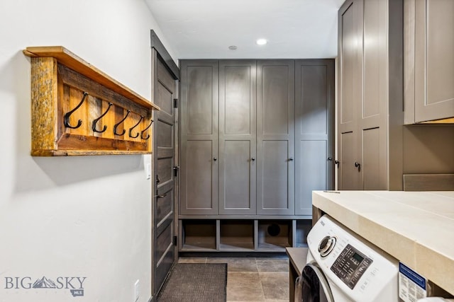 146 Outlook Trl, Big Sky, MT 59716 - washroom featuring cabinet space, washer / dryer, and recessed lighting