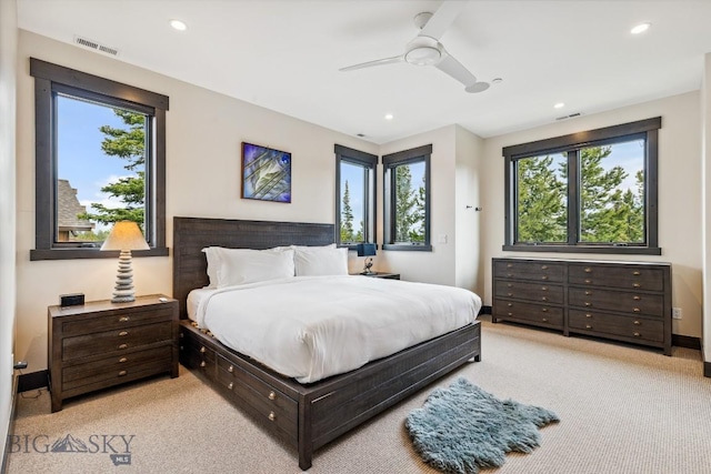 146 Outlook Trl, Big Sky, MT 59716 - bedroom featuring multiple windows, carpet floors, recessed lighting, and ceiling fan