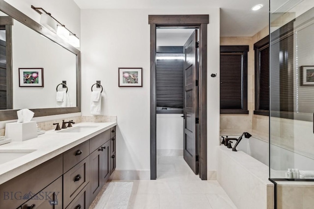 146 Outlook Trl, Big Sky, MT 59716 - bathroom with double vanity, a bath, tile patterned flooring, and decorative backsplash