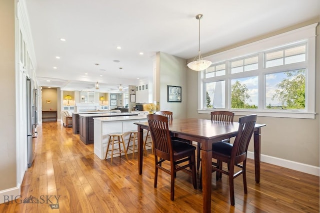 33 Oasis Trl, Bozeman, MT 59718 - dining area with light wood-type flooring and recessed lighting