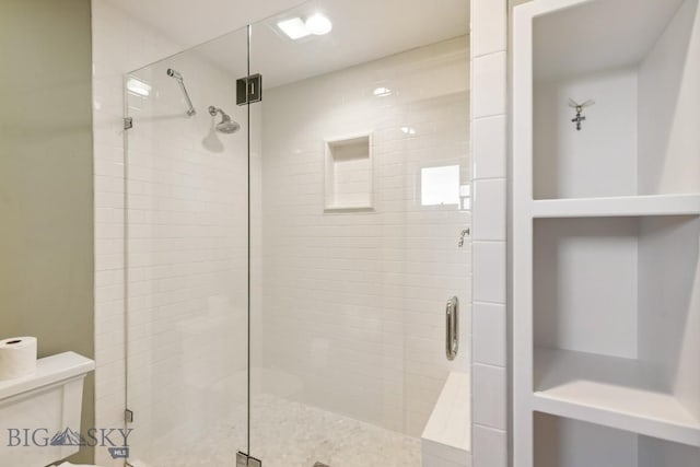 33 Oasis Trl, Bozeman, MT 59718 - bathroom featuring a stall shower and toilet