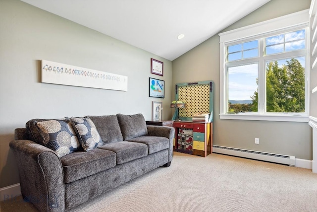33 Oasis Trl, Bozeman, MT 59718 - living room featuring a baseboard radiator, lofted ceiling, and carpet floors