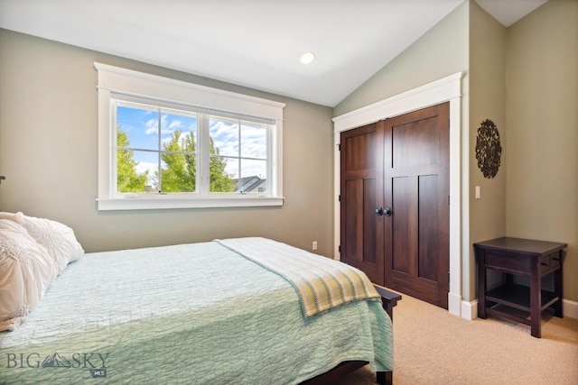 33 Oasis Trl, Bozeman, MT 59718 - carpeted bedroom featuring vaulted ceiling, a closet, and recessed lighting