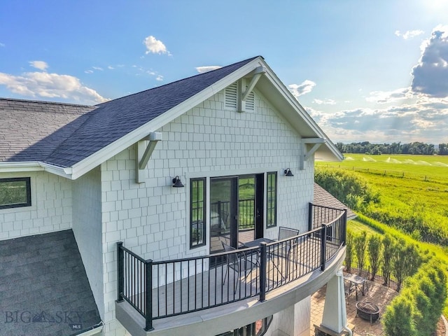 33 Oasis Trl, Bozeman, MT 59718 - view of property exterior featuring roof with shingles and a central air condition unit