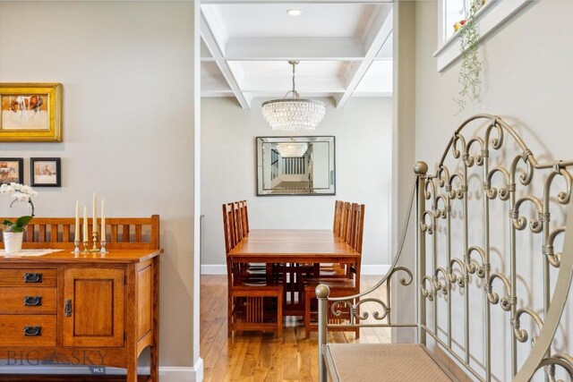 33 Oasis Trl, Bozeman, MT 59718 - dining room with light wood-type flooring, beam ceiling, coffered ceiling, and a chandelier
