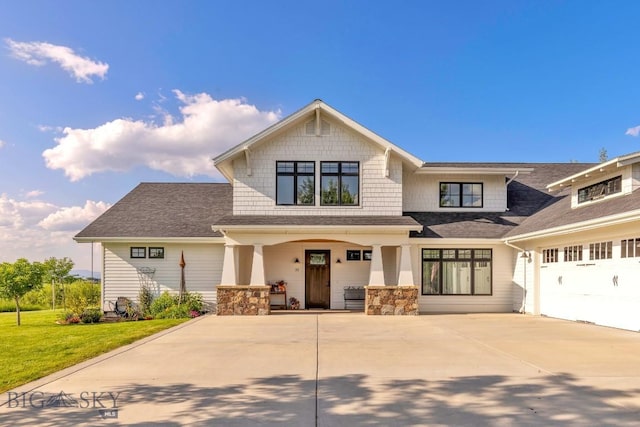 33 Oasis Trl, Bozeman, MT 59718 - craftsman inspired home featuring concrete driveway, covered porch, and a front yard