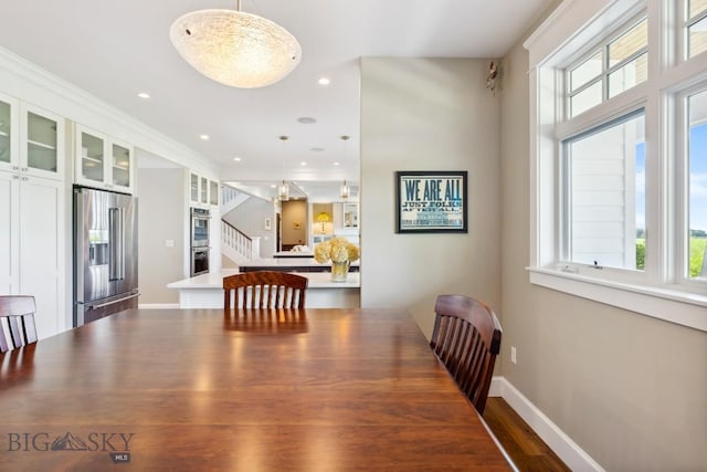 33 Oasis Trl, Bozeman, MT 59718 - dining space with stairway, recessed lighting, and wood finished floors