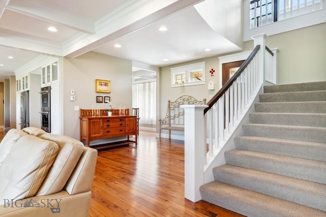 33 Oasis Trl, Bozeman, MT 59718 - stairway with wood finished floors, ornamental molding, recessed lighting, and beam ceiling