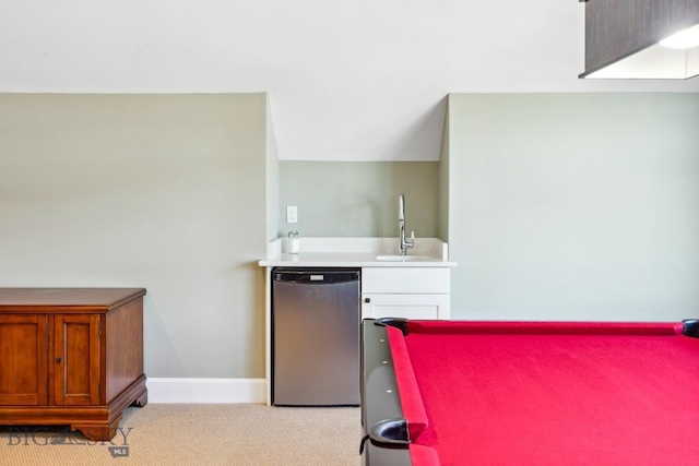 33 Oasis Trl, Bozeman, MT 59718 - bedroom with wet bar and light colored carpet