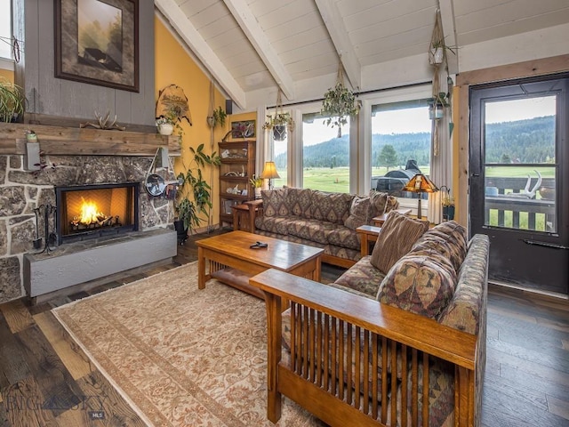 20 Yellowstone Spur Rd Unit 20A, Big Sky, MT 59716 - living area featuring wood finished floors, a fireplace, and wooden ceiling