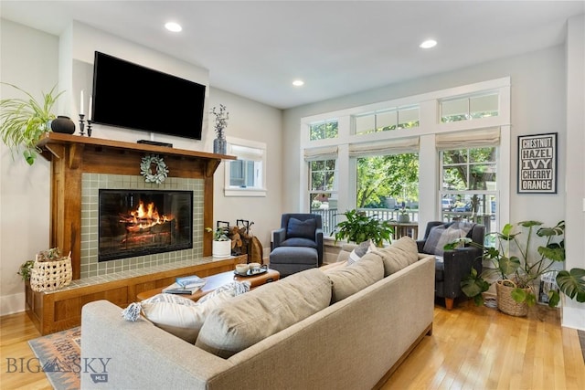 425 S Yellowstone St, Livingston, MT 59047 - living area featuring light wood finished floors, a fireplace, and recessed lighting