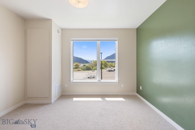 2221F Willow Unit 104, Livingston, MT 59047 - empty room featuring light colored carpet and baseboards