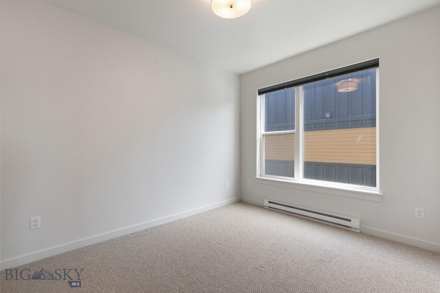 2221F Willow Unit 104, Livingston, MT 59047 - carpeted empty room with a baseboard radiator and baseboards