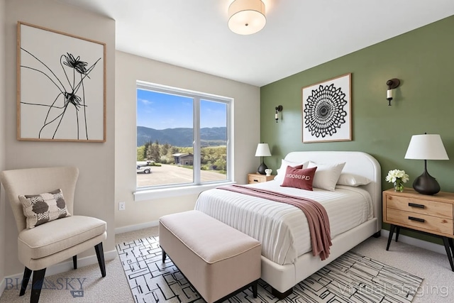 2221F Willow Unit 104, Livingston, MT 59047 - bedroom featuring a mountain view and carpet floors