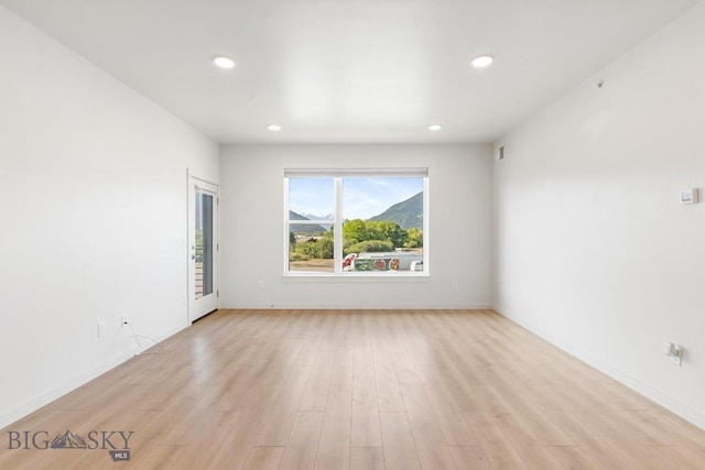 2221F Willow Unit 104, Livingston, MT 59047 - unfurnished room featuring light wood-style floors and recessed lighting