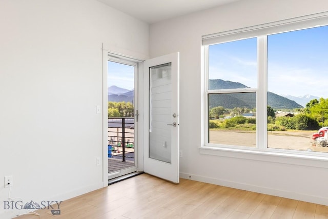 2221F Willow Unit 104, Livingston, MT 59047 - entryway featuring a mountain view and light wood finished floors