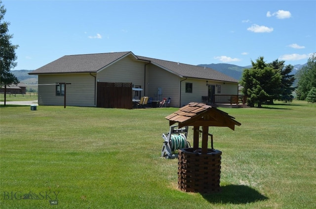 5 Ginger Quill Ct, Mcallister, MT 59740 - rear view of property with a lawn and a mountain view