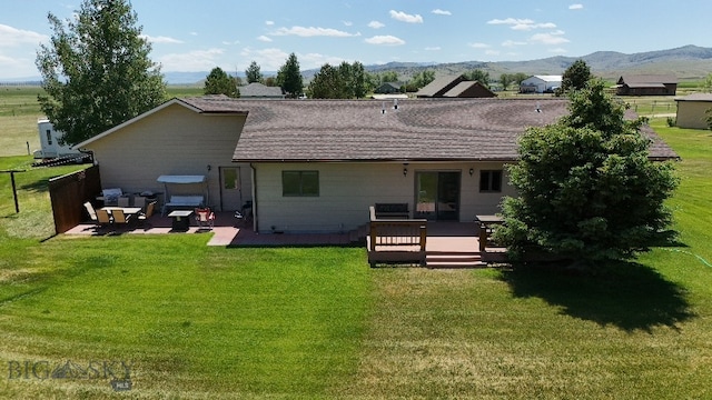 5 Ginger Quill Ct, Mcallister, MT 59740 - rear view of property with a patio and a deck with mountain view