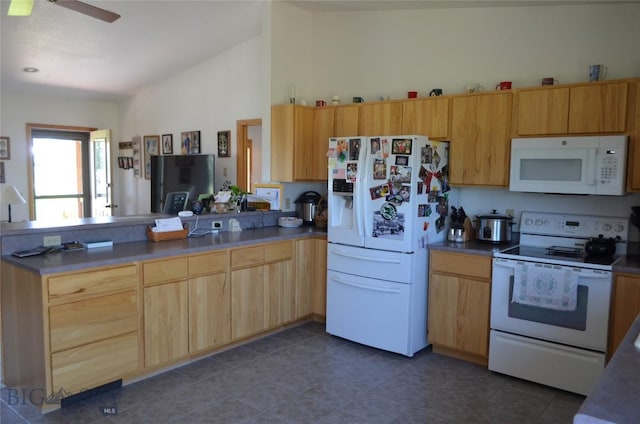 5 Ginger Quill Ct, Mcallister, MT 59740 - kitchen with white appliances, a peninsula, vaulted ceiling, light brown cabinets, and a ceiling fan