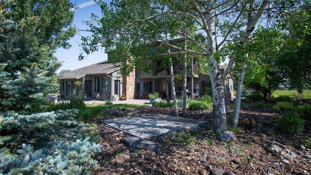 3640 Jagar Ln, Bozeman, MT 59718 - back of property with a sunroom