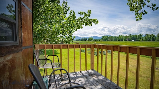 3640 Jagar Ln, Bozeman, MT 59718 - deck featuring a lawn and a mountain view