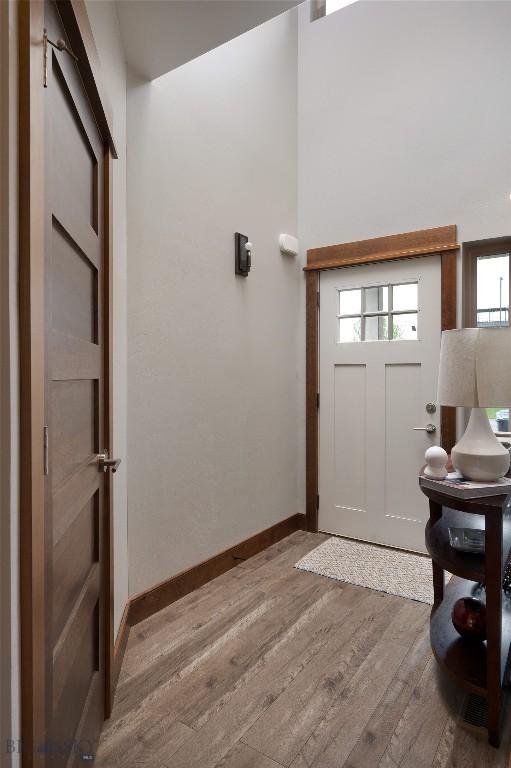 2740 Cobblestone Unit A, Bozeman, MT 59718 - entrance foyer with wood finished floors and a high ceiling