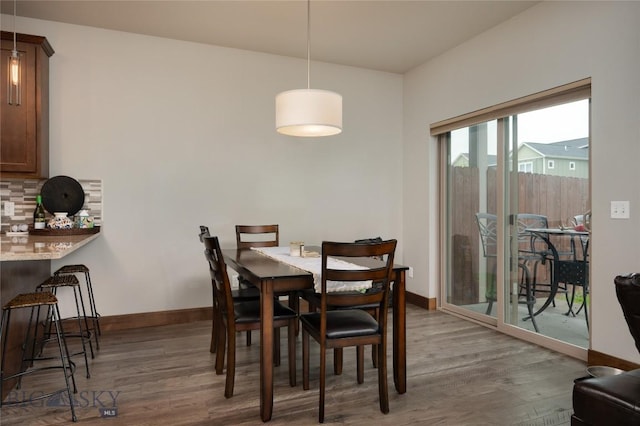 2740 Cobblestone Unit A, Bozeman, MT 59718 - dining room with wood finished floors and baseboards
