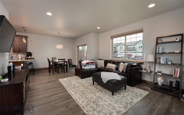2740 Cobblestone Unit A, Bozeman, MT 59718 - living area featuring dark wood-type flooring and recessed lighting