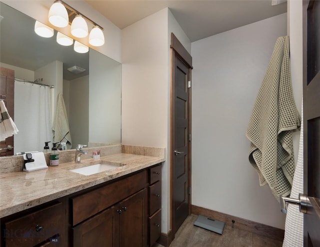 2740 Cobblestone Unit A, Bozeman, MT 59718 - full bathroom with vanity and baseboards