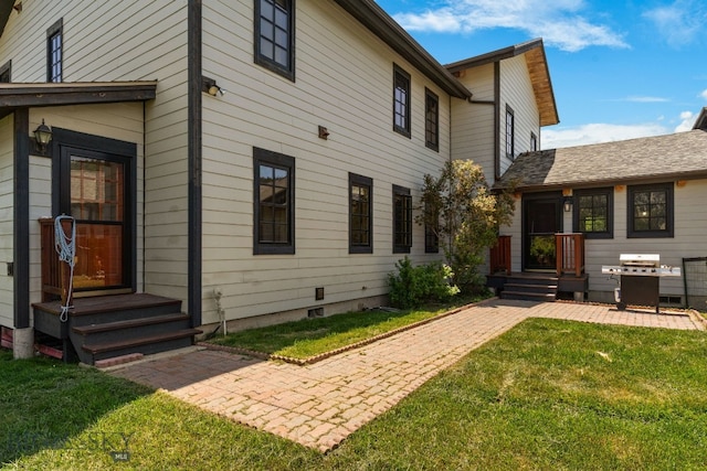 250 Silver Run Rd, Gallatin Gateway, MT 59730 - rear view of house featuring a lawn