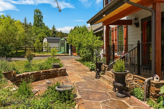 250 Silver Run Rd, Gallatin Gateway, MT 59730 - view of patio with a shed