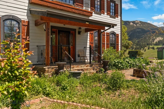 250 Silver Run Rd, Gallatin Gateway, MT 59730 - doorway to property featuring a mountain view