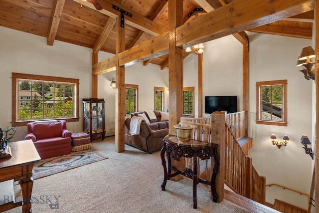 250 Silver Run Rd, Gallatin Gateway, MT 59730 - carpeted living room with a wood ceiling with exposed beams and high vaulted ceiling