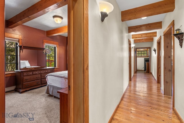 250 Silver Run Rd, Gallatin Gateway, MT 59730 - hallway with beam ceiling and light wood-style floors