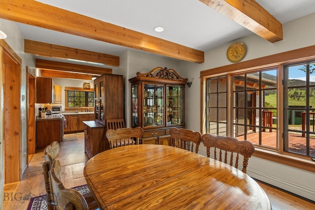 250 Silver Run Rd, Gallatin Gateway, MT 59730 - dining room featuring beam ceiling, light wood-type flooring, recessed lighting, and baseboard heating