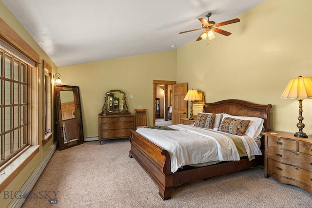 250 Silver Run Rd, Gallatin Gateway, MT 59730 - bedroom featuring vaulted ceiling, a baseboard heating unit, light carpet, and ceiling fan