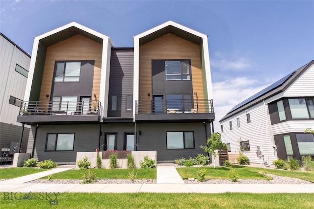 3083 S 27th Ave, Bozeman, MT 59718 - view of front facade with a balcony and a front yard