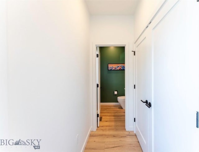 3083 S 27th Ave, Bozeman, MT 59718 - hall featuring light wood-style flooring and baseboards