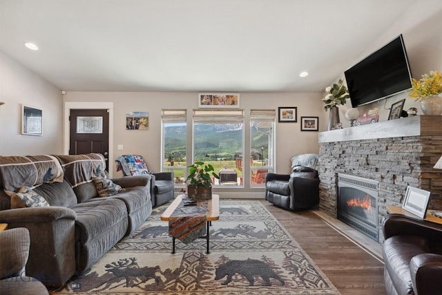 444 Highpark, Anaconda, MT 59711 - living area featuring a fireplace, wood finished floors, and recessed lighting