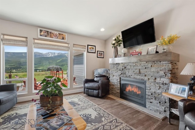 444 Highpark, Anaconda, MT 59711 - living room with a stone fireplace, wood finished floors, and recessed lighting