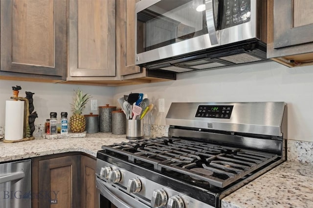 444 Highpark, Anaconda, MT 59711 - kitchen with stainless steel appliances and light stone counters