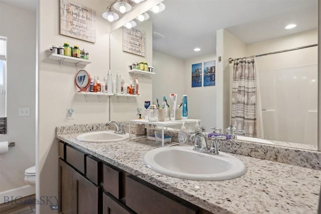 444 Highpark, Anaconda, MT 59711 - bathroom with double vanity, curtained shower, and recessed lighting