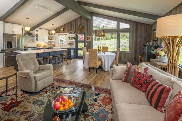 17 Chief Joseph Trl, Big Sky, MT 59716 - living area with light wood finished floors and wooden walls